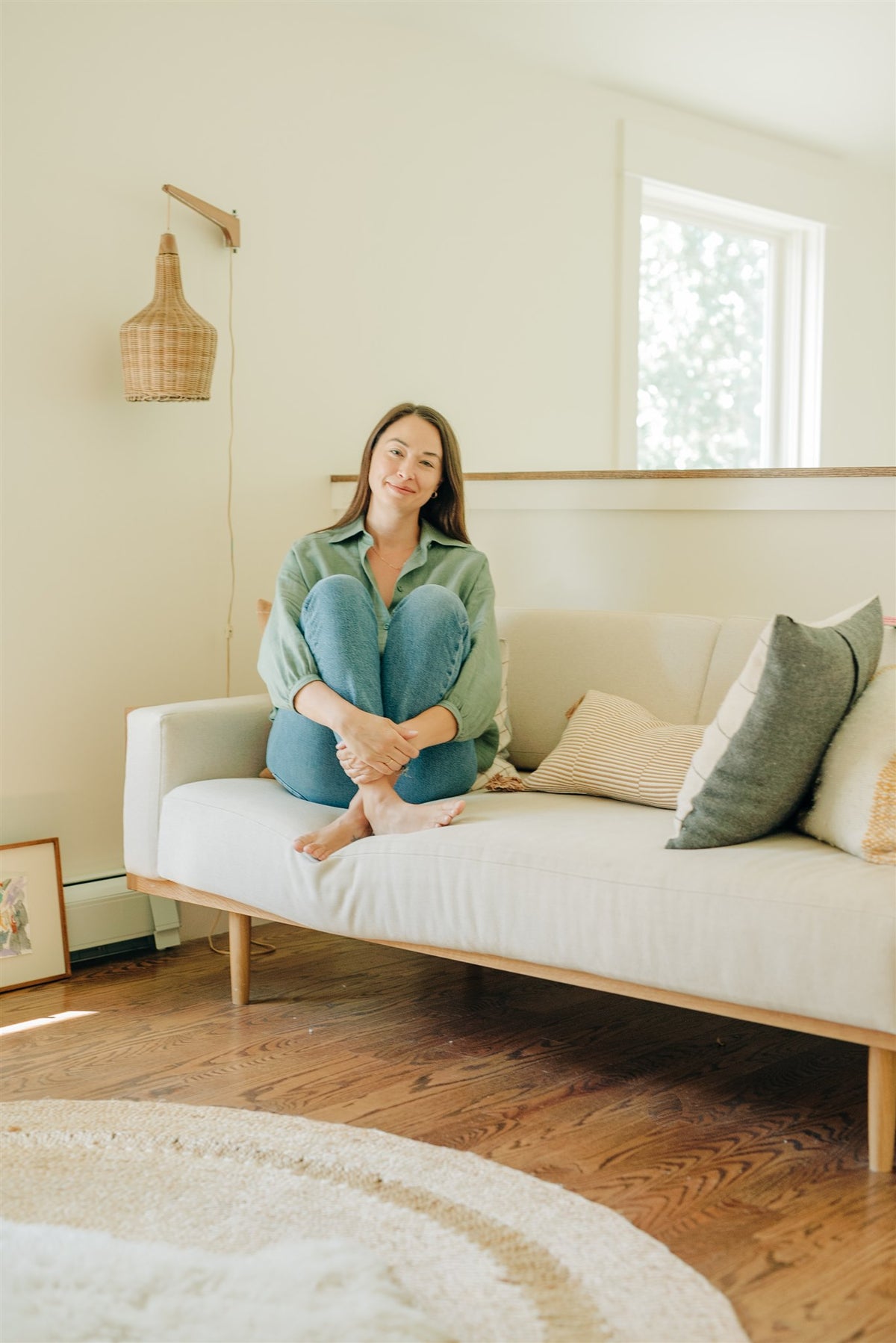 Sheena Marshall seated in a light-filled room