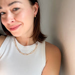 Triple Hoop Earrings styled on a model, emphasizing their minimalist yet bold statement.