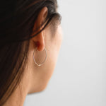 Arc open hoop threader earrings, long back open hoops, wishbone shaped hoop earrings, lightly hammered petal shaped hoops, lightweight hoops, Sheena Marshall Jewelry, Denver, Colorado