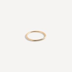 14k gold thin stacking ring by Sheena Marshall Jewelry, featuring a minimalist, polished design perfect for everyday wear and stacking