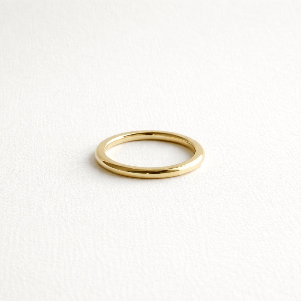 Gold ring on a white background