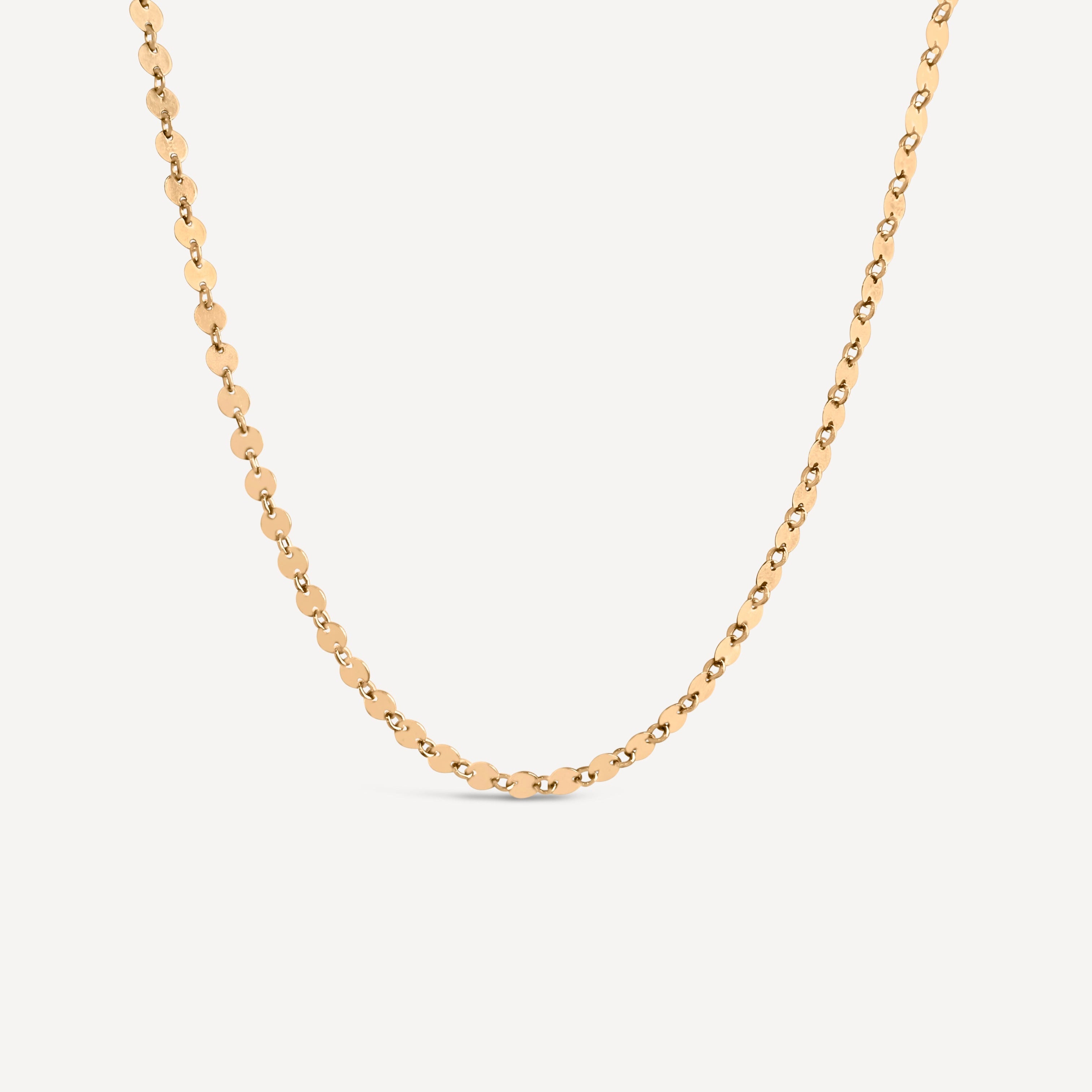 Gold fill confetti chain necklace on a white background