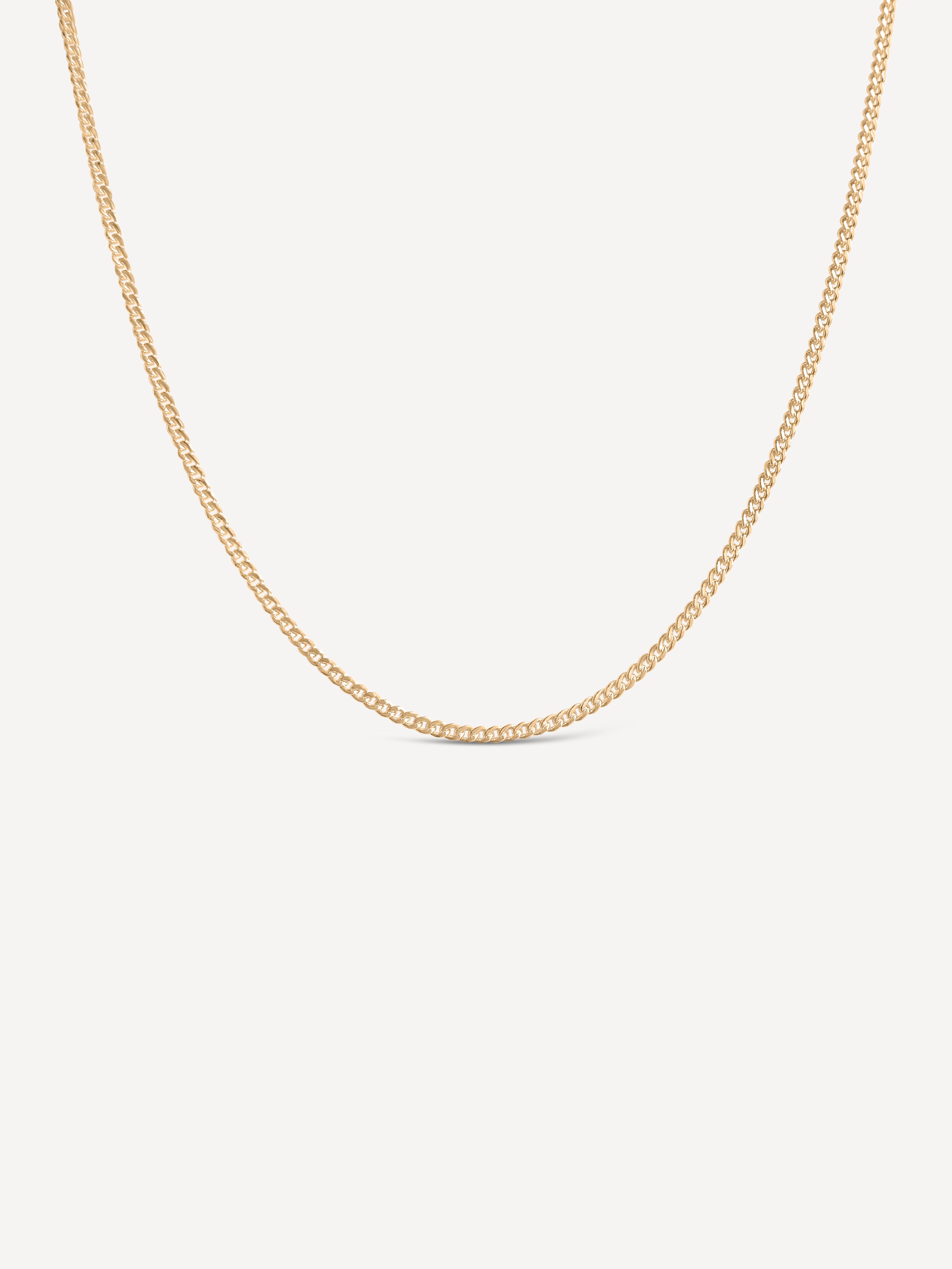 14k gold fill curb chain necklace on a light gray background