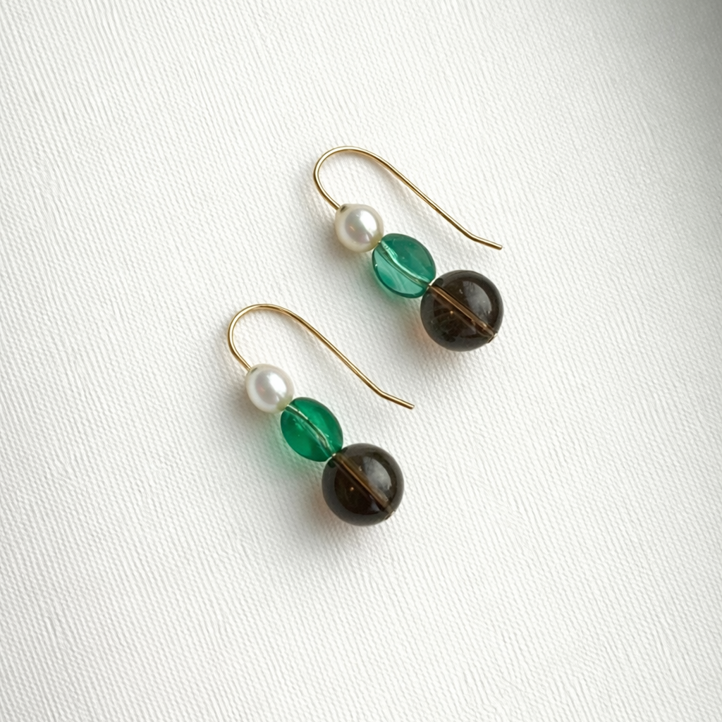 Green glass_Freshwater Pearls_smoky quartz gold fill earrings on linen background