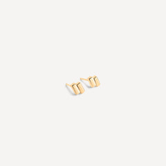 Solid gold geometric bar studs with clean lines and modern design, handcrafted for everyday minimal jewelry style