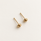 Open Circle Studs, solid gold — top view