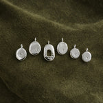 Organic Molten Pendants on olive suede cloth