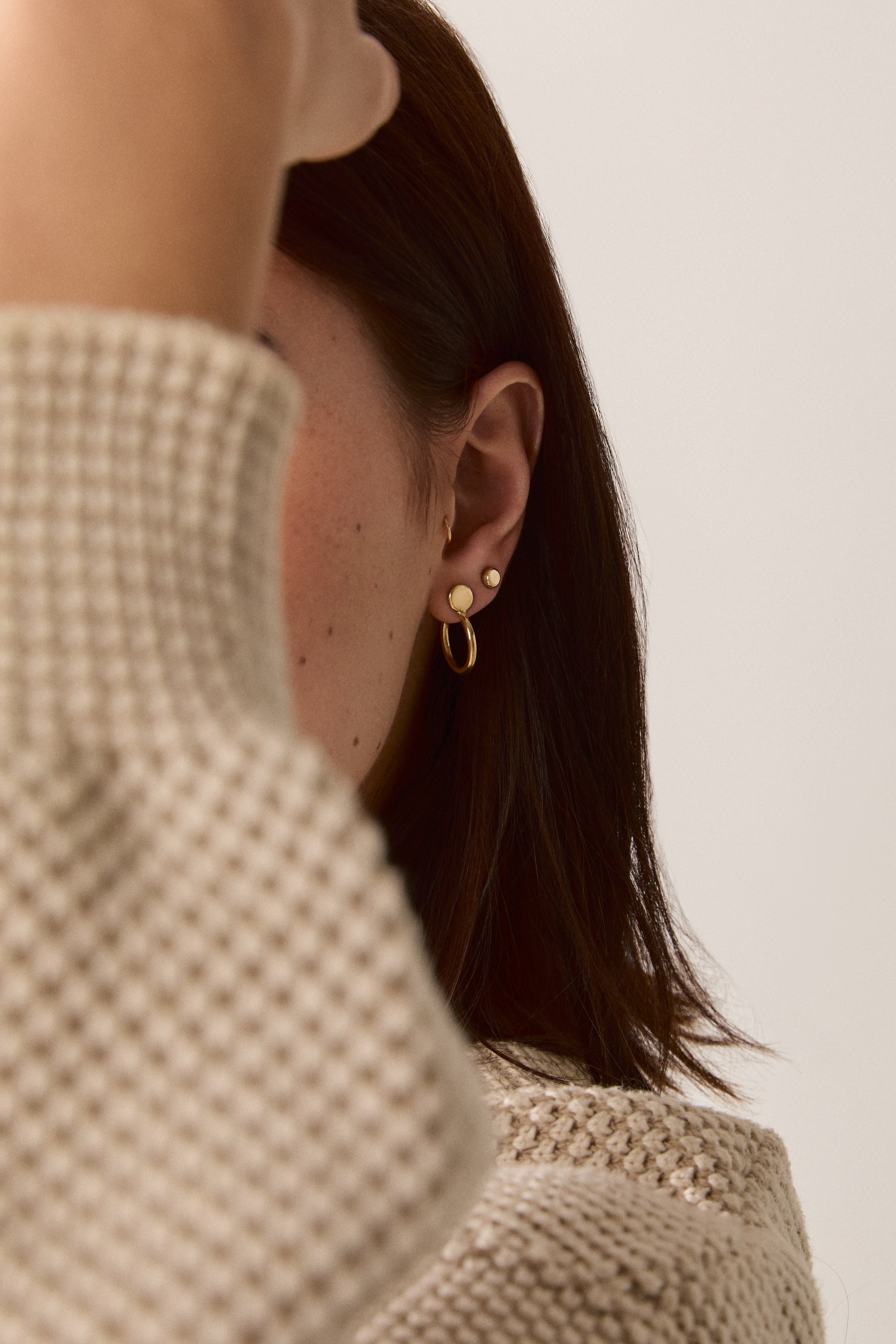 Circle Forma Hoops, 14k Solid Gold worn on a model