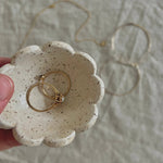 Cream Flower Ring Dish, Handmade held in a hand with rings inside