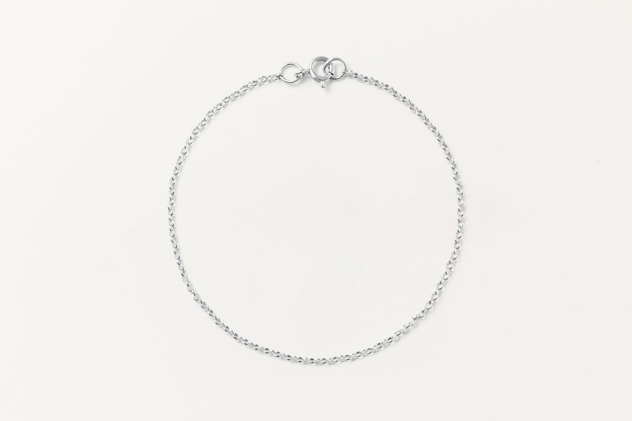 Delicate sterling silver chain bracelet by Sheena Marshall Jewelry, perfect for everyday layering and stacking.