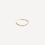 Close-up of the Emilie Arch Ring’s smooth, gold-filled finish.