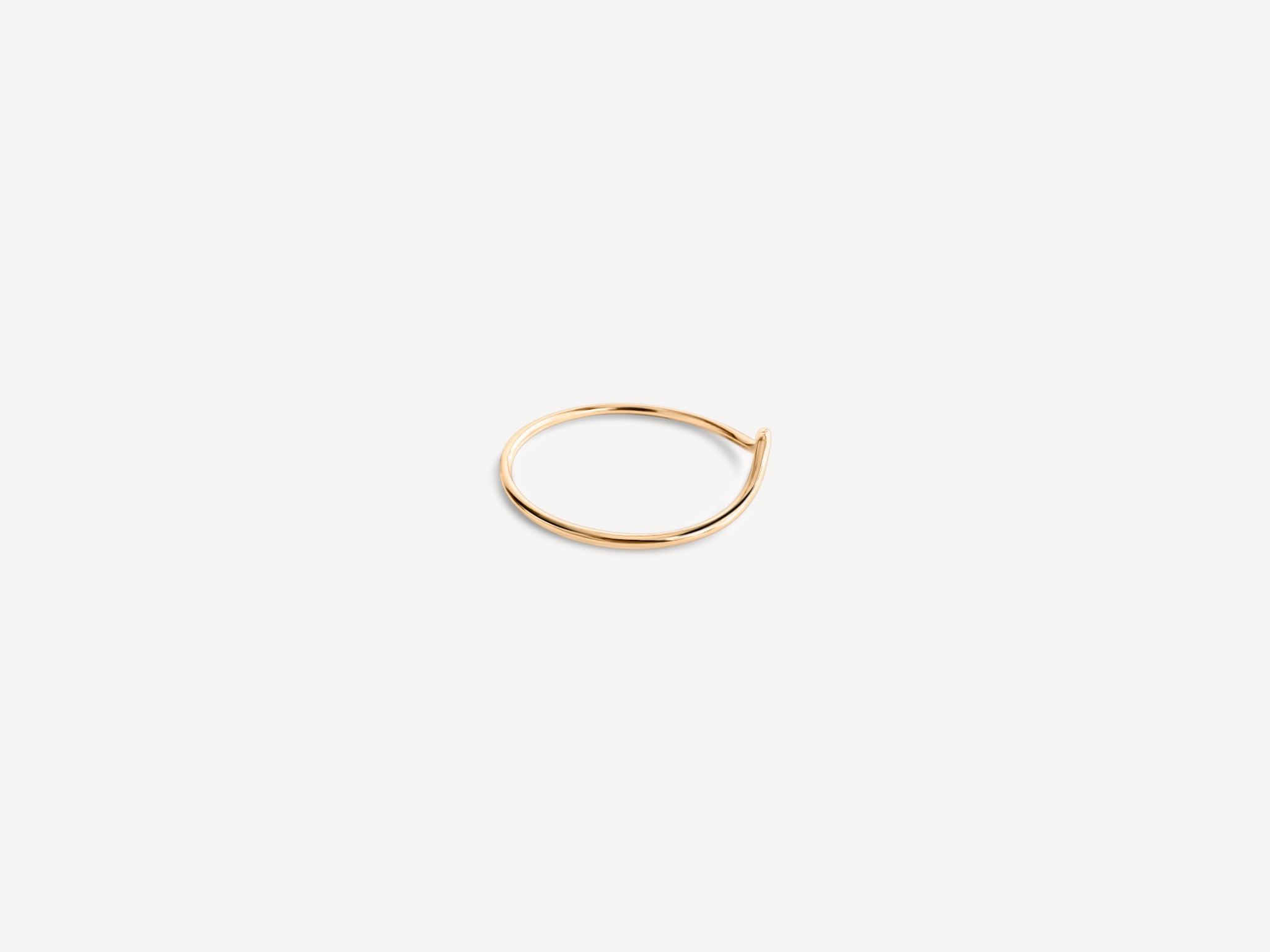 Close-up of the Emilie Arch Ring’s smooth, gold-filled finish.