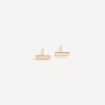 Solid gold flat bar stud earrings with a polished finish shown on a white background.