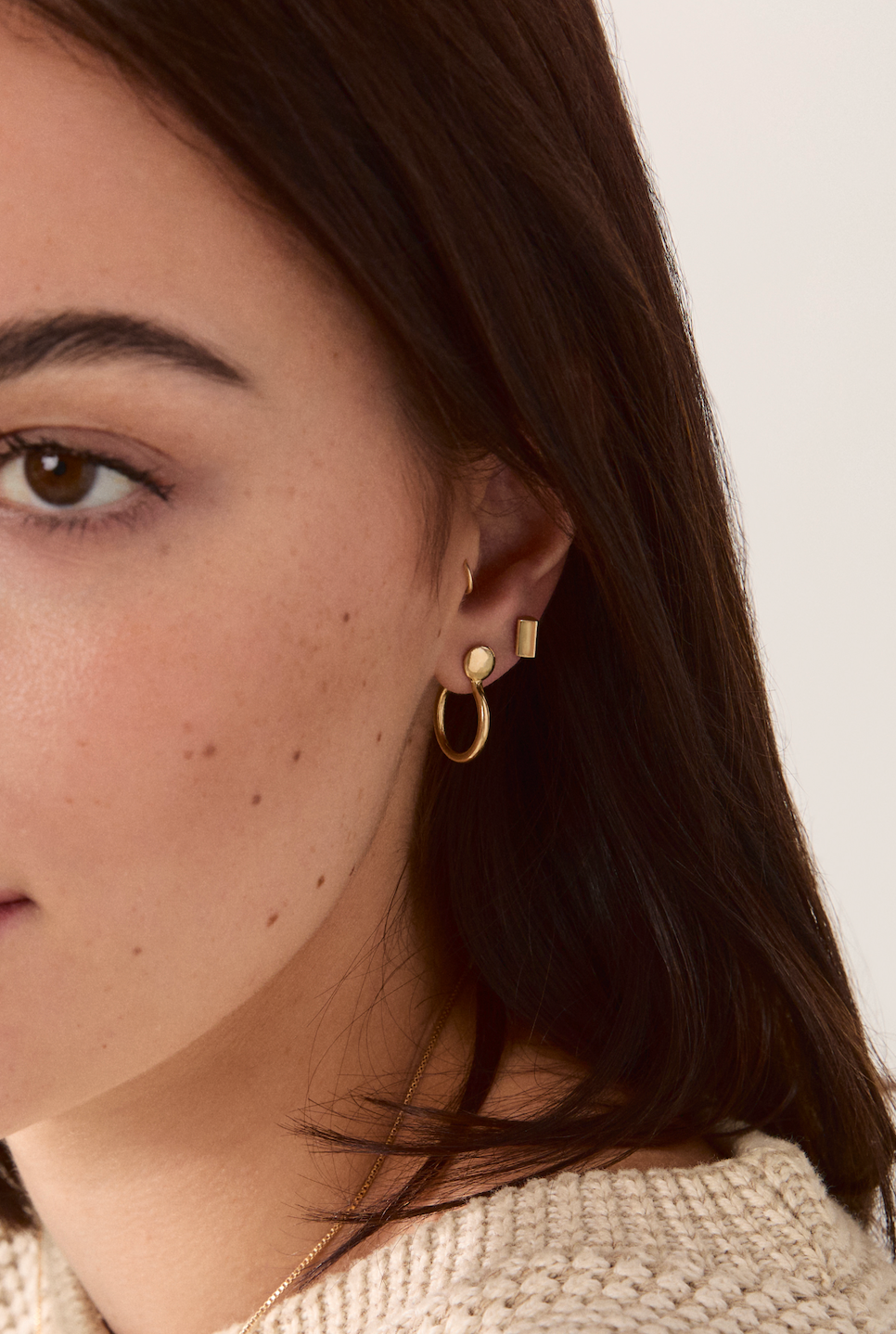 Model wearing the Forma Circle Hoops showcasing their polished finish and minimalist design.