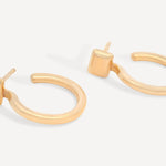 Front view of Forma Rectangle Hoops in 14k recycled solid gold, showcasing the sleek rectangular detail.