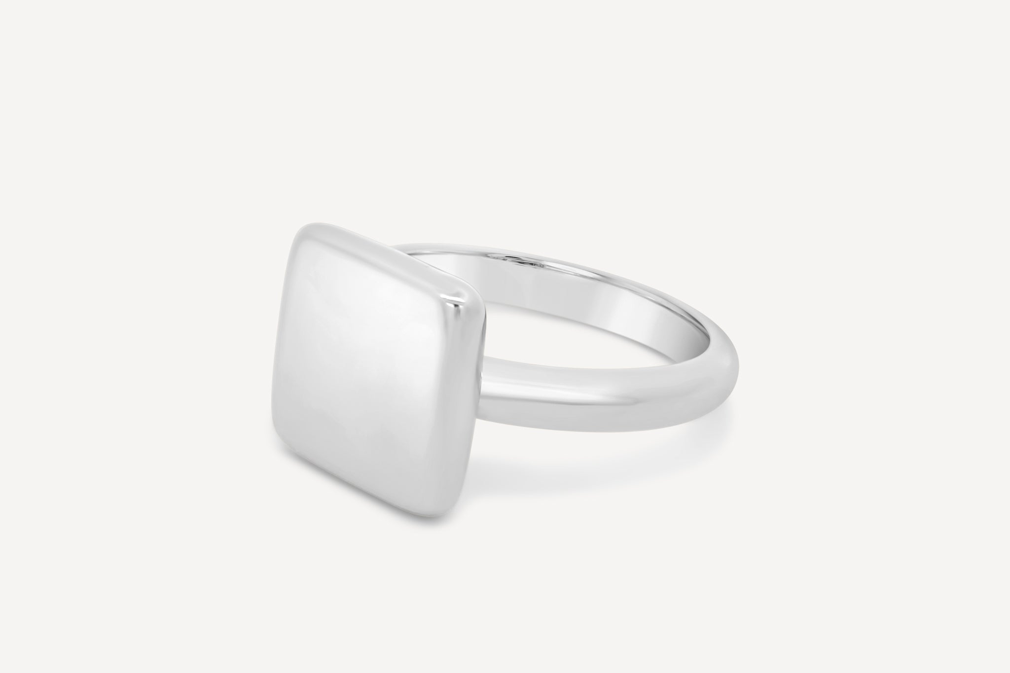 Forma Square Ring crafted in solid sterling silver with a minimalist square design on a white background.