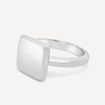 Forma Square Ring crafted in solid sterling silver with a minimalist square design on a white background.