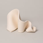 Furl Art Object, Bone — three sculptural forms