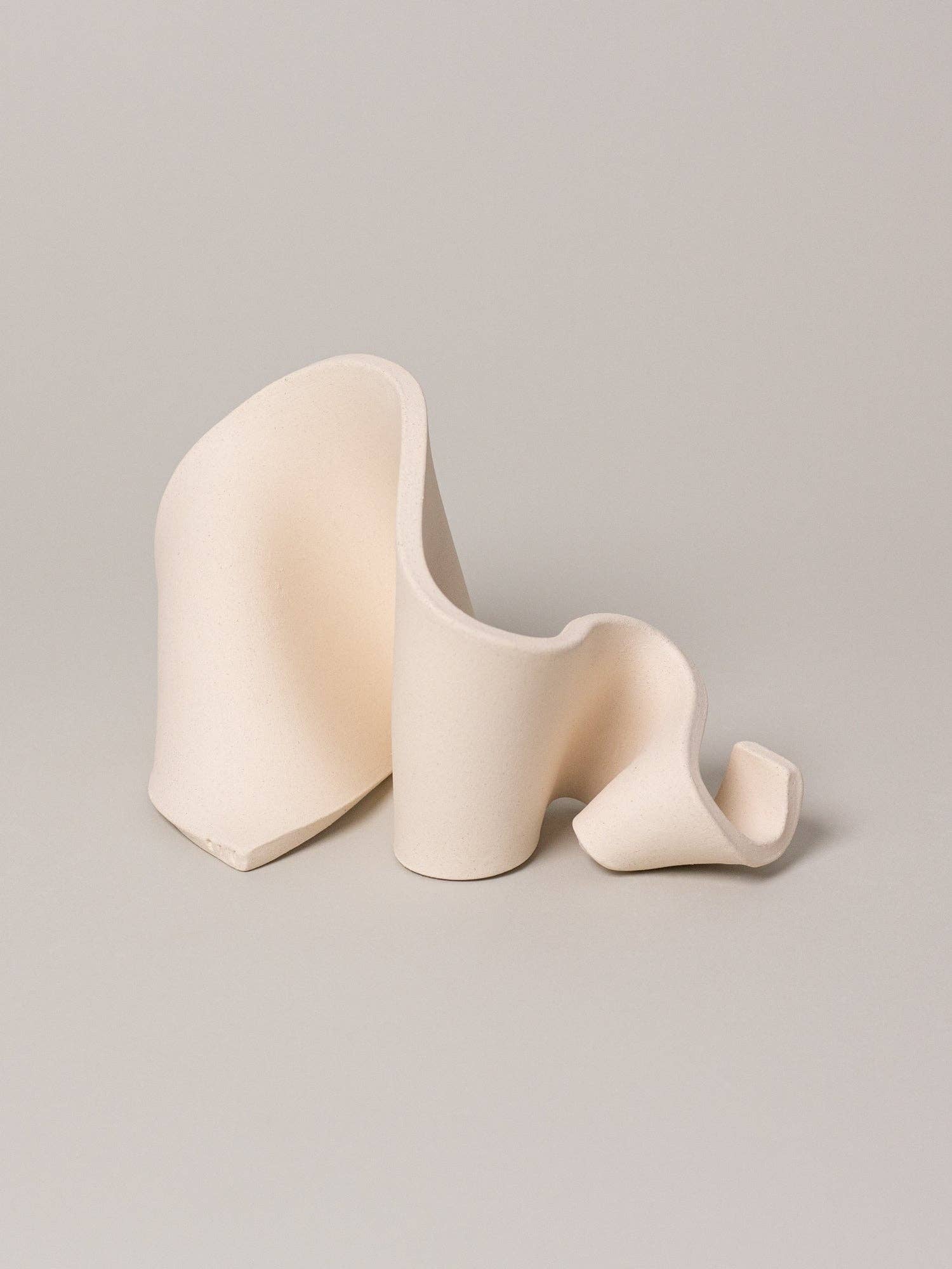 Furl Art Object, Bone — three sculptural forms