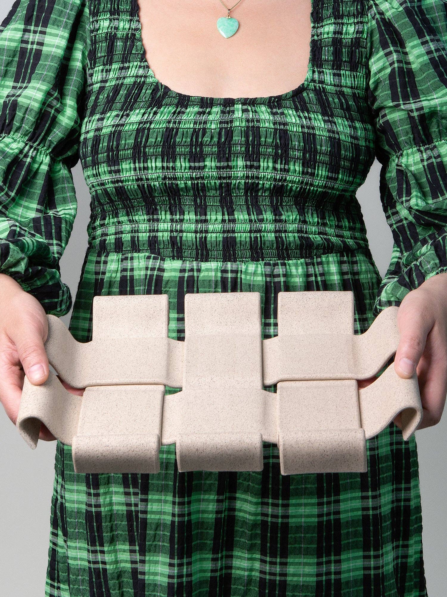 Gala Tray, Sand held at waist level