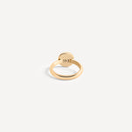 Back view of the solid gold signet ring, highlighting the engraved SM logo for a personalized detail.