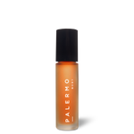 Harmonizing Aromatherapy Oil against a black background