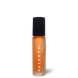 Harmonizing Aromatherapy Oil against a black background