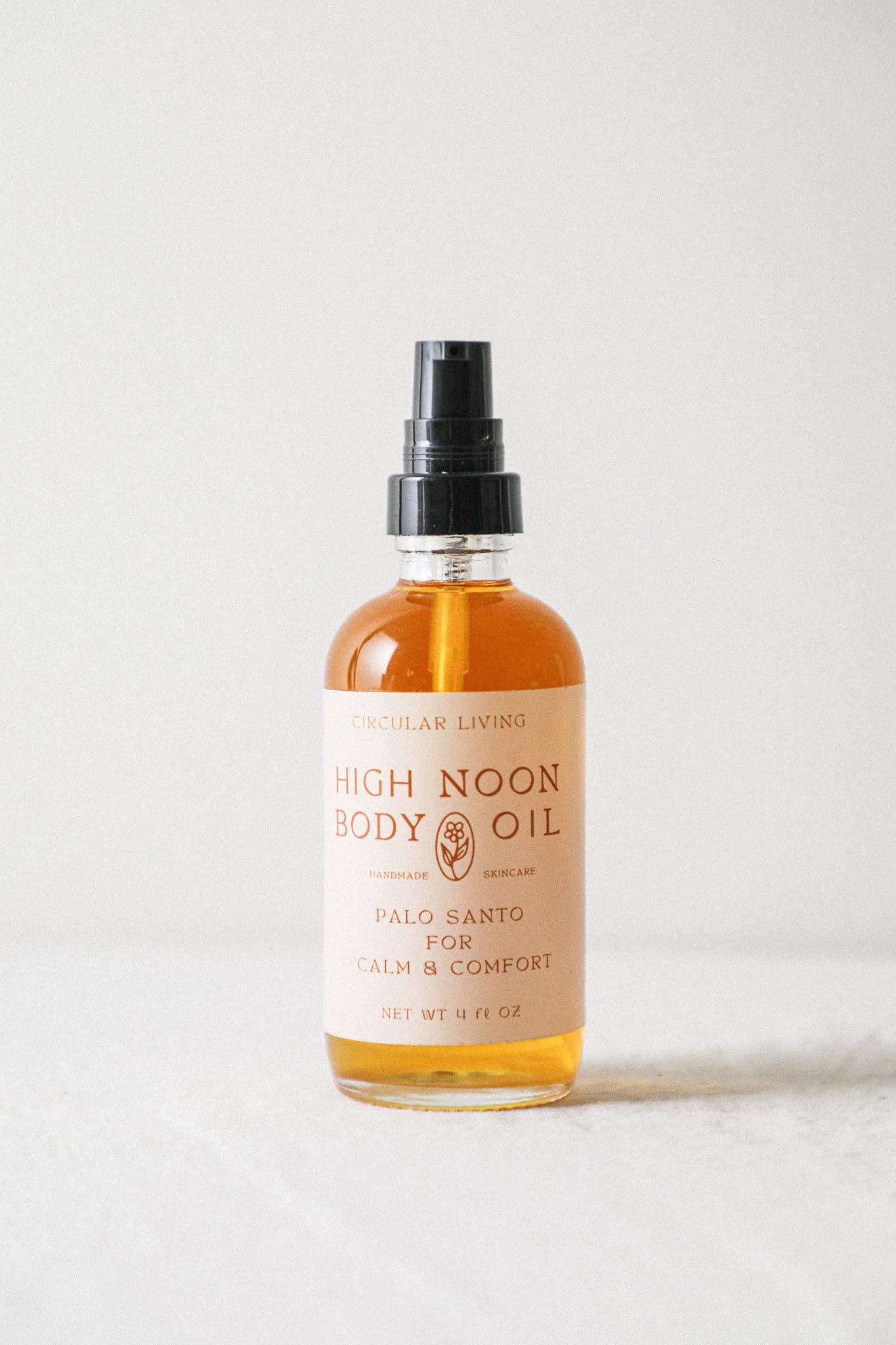 High Noon Body Oil, Palo Santo: Travel Size 2 fl oz — bottle close-up