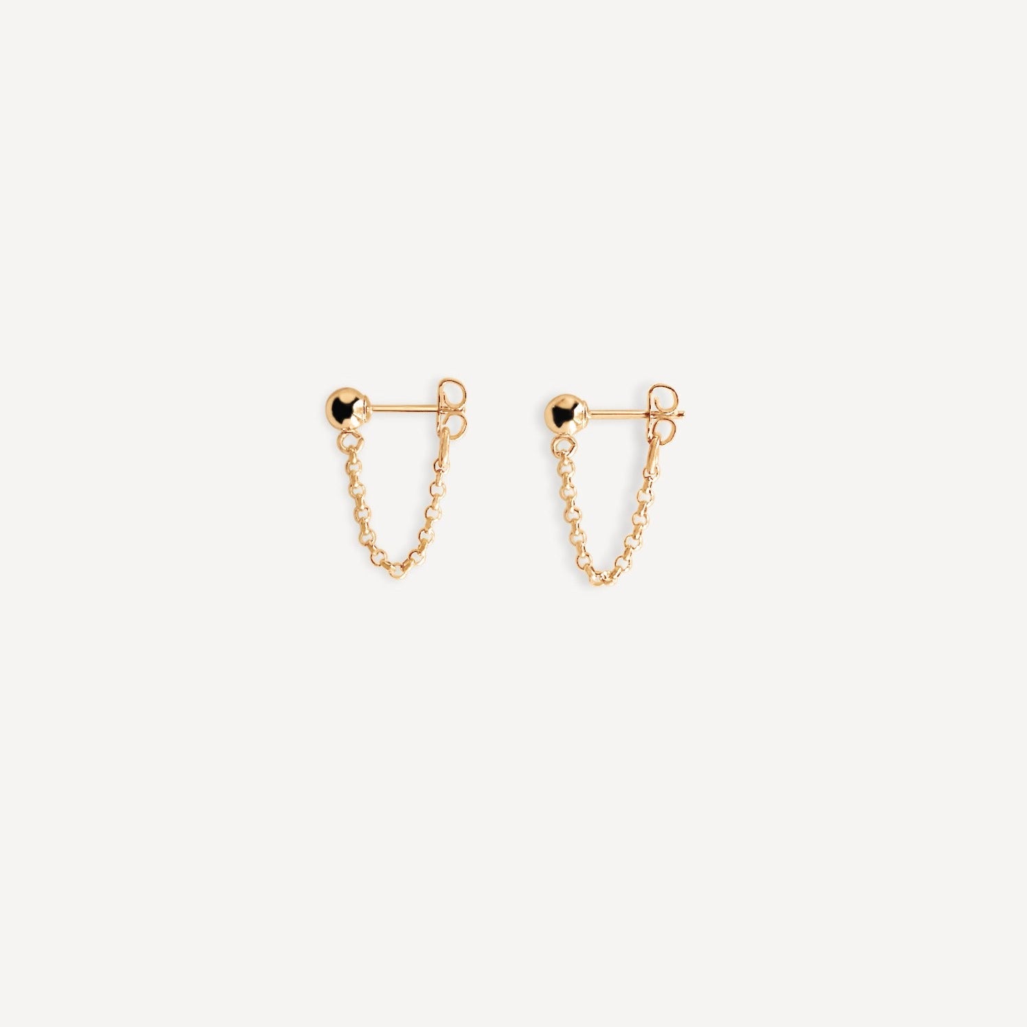 Hudson Earrings in gold fill displayed as a pair, highlighting their timeless stud design and subtle movement.