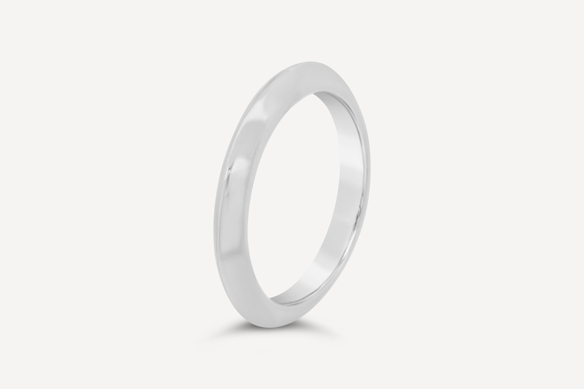 Knife Edge Band in sterling silver, displayed on a white background, highlighting its sleek and modern design.