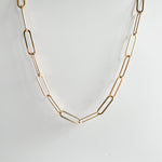 Lola Chunky Paperclip Chain in gold fill, showcasing the larger links and adjustable design on a white background.