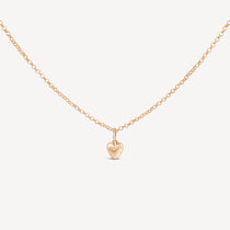 Lou Puff Heart Necklace in gold fill, showcasing the softly puffed heart pendant on a delicate chain.