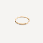 Maeve 1.5mm round stacking ring gold fill on white background, minimal design