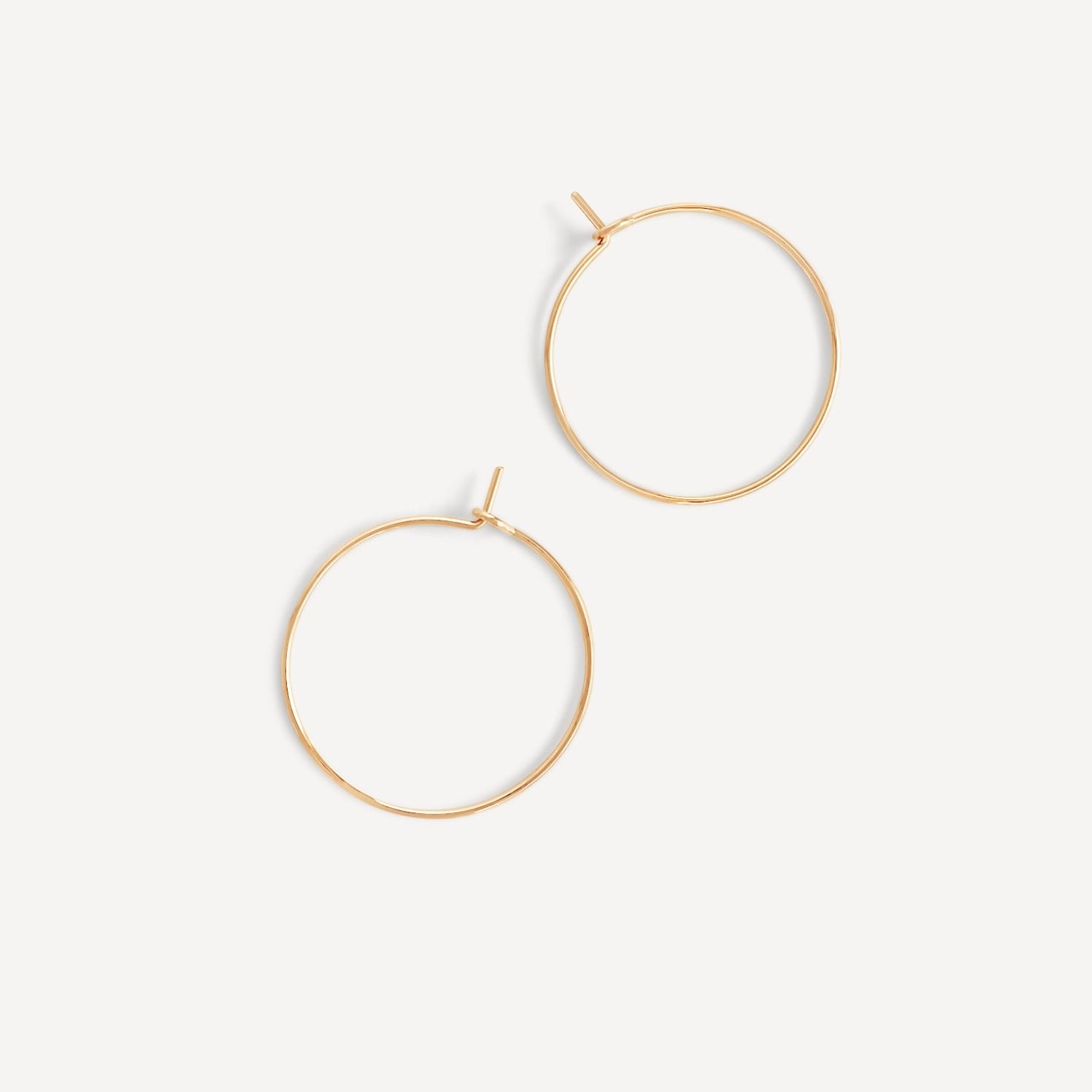 Minimal gold fill hoops 1 inch - classic lightweight earrings for everyday wear.