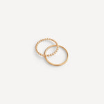 Ophelia Dot Ring crafted in Denver, Colorado, shown stacked with other rings for a timeless and personalized jewelry collection.