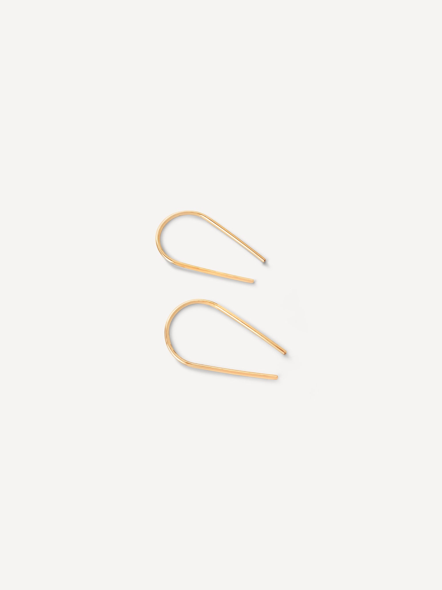 Palmer Arch Threader Earrings shown flat, highlighting their simple gold-filled wire design and approximate 3/4-inch length.