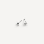 Petite Knot Studs crafted in sterling silver, displayed on a clean white background.