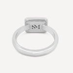 Close-up of the interior of the sterling silver rectangle ring, featuring the stamped SM logo for added detail