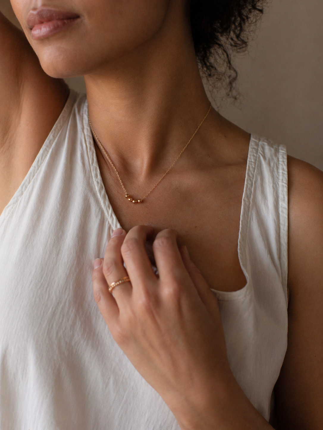 Sphere Necklace, Gold Fill worn on a model