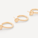 Trio of solid gold mini hoops featuring three distinct shapes: square, round, and oval, displayed on a neutral background.