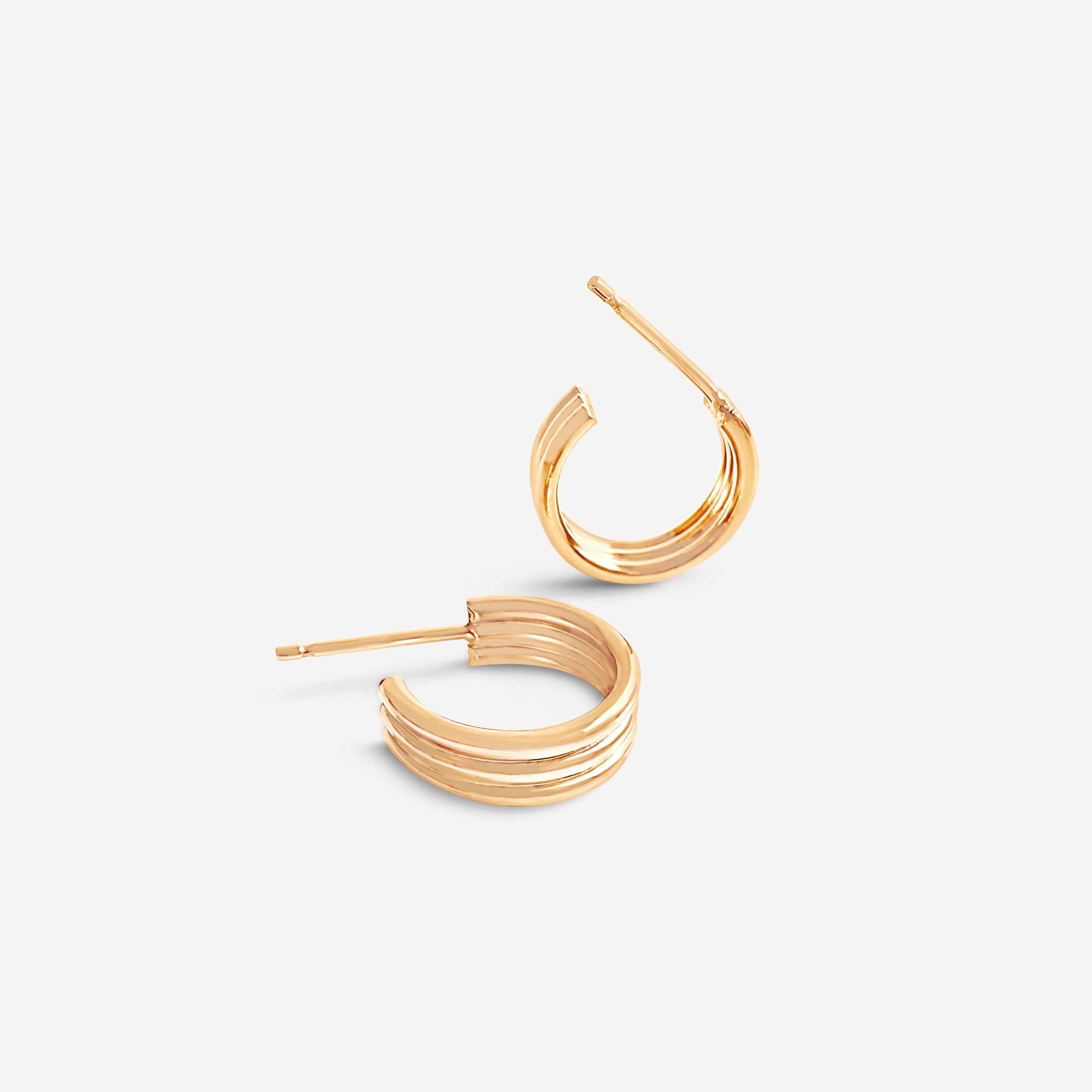 Triple Hoop Earrings in 14k gold fill, showcasing minimalist design and craftsmanship.