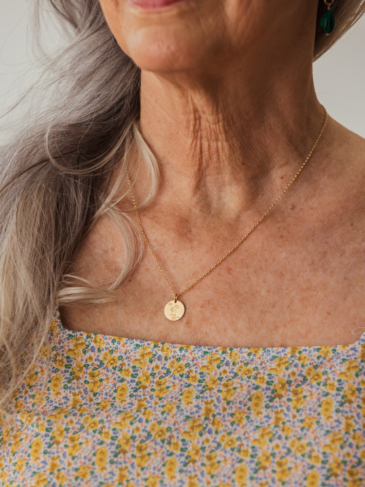 Wild Daisy Pendant Necklace worn on a model