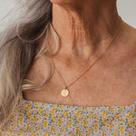 Wild Daisy Pendant Necklace worn on a model