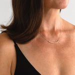 Gold Fill Noodle Necklace, Minimal Gold Tube Necklace, Simple Gold Layering Necklace, Sliding Curved Bar on Delicate Gold Chain, Hollow Tube, Sheena Marshall Jewelry, Denver, Colorado