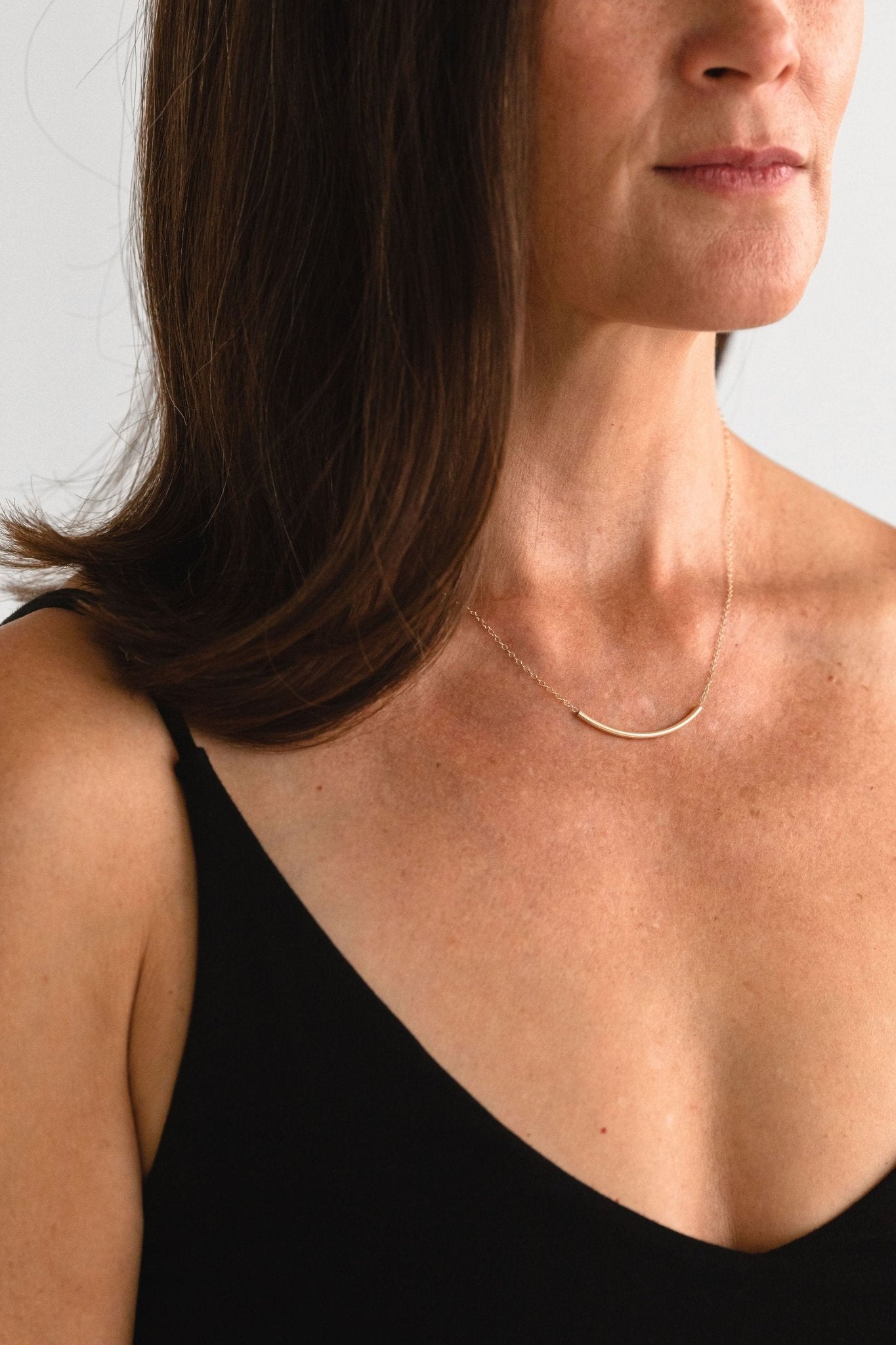 Gold Fill Noodle Necklace, Minimal Gold Tube Necklace, Simple Gold Layering Necklace, Sliding Curved Bar on Delicate Gold Chain, Hollow Tube, Sheena Marshall Jewelry, Denver, Colorado