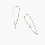 Close-up of gold fill long threader earrings highlighting the delicate and lightweight design.