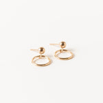 Handcrafted Circlet Earrings by Sheena Marshall Jewelry, featuring 10mm gold-filled circles and ball studs for a minimalist, timeless design. Crafted in Denver.