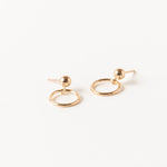 Handcrafted Circlet Earrings by Sheena Marshall Jewelry, featuring 10mm gold-filled circles and ball studs for a minimalist, timeless design. Handmade in Denver.