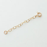 Gold-filled detachable chain extender with a spring clasp, perfect for customizing necklace lengths.