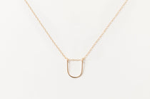 Gold-filled Empower Arch Necklace with delicate cable chain.